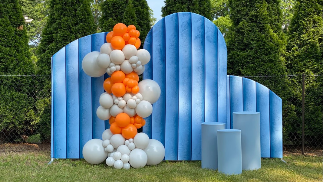 Balloon garland with backdrops & cylinder stands. We service Tweed, Belleville & surrounding areas!